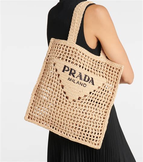prada woven beach bag